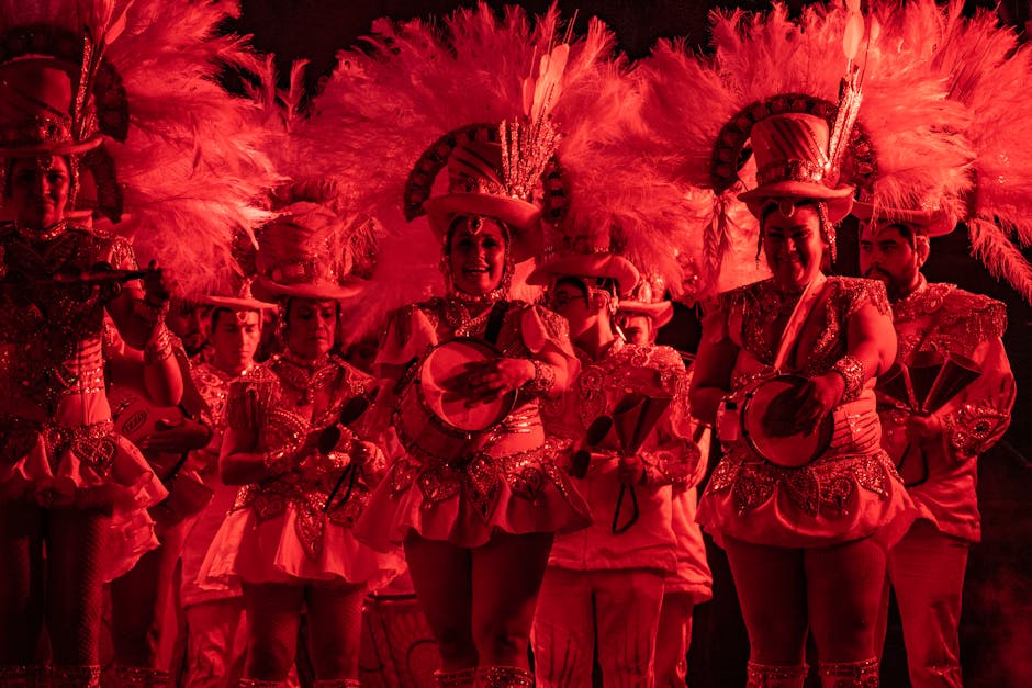 Colorful carnival performers play music and dance, capturing festive spirit with elaborate costumes and vibrant lighting